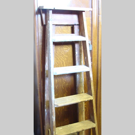 A wooden stepladder, together with an aluminium ladder