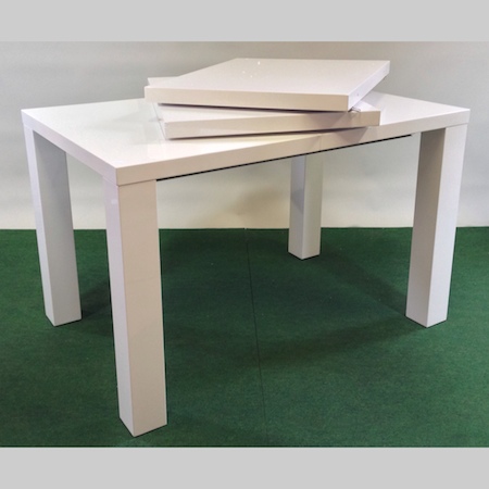 A contemporary white extending dining table, with two additional leaves, 240 x 80cm