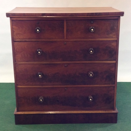 A Victorian flame mahogany chest of drawers, on a plinth base, 117cm