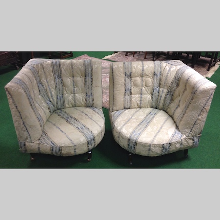 A pair of large blue and cream upholstered button back corner chairs, 110cm each