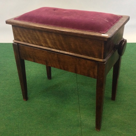 An early 20th century mahogany adjustable piano stool, 56cm