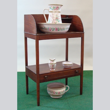 A George III mahogany washstand, 60cm, together with a Staffordshire wash set