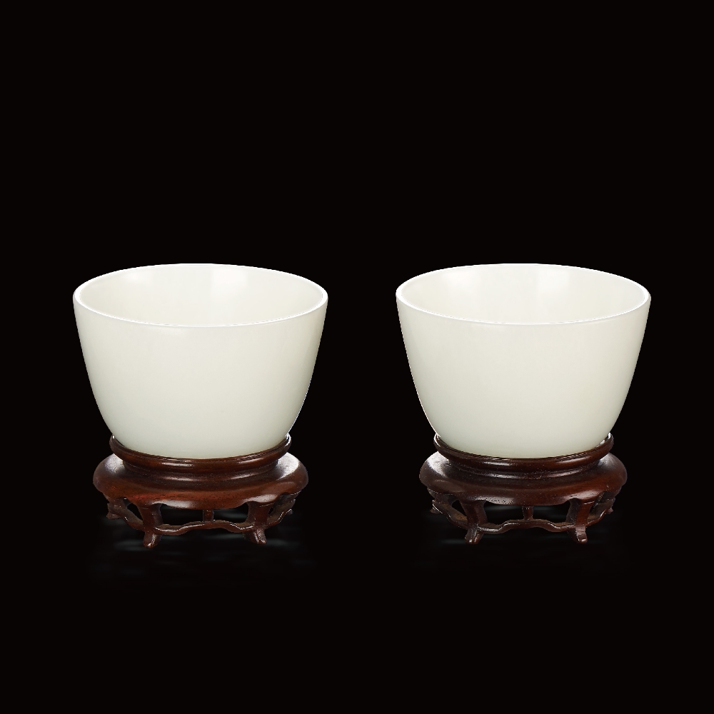 A PAIR OF WHITE JADE CUPS YONGZHENG FOUR-CHARACTER MARK AND OF THE PERIOD (1723-1735) D 7.4 cm. (2