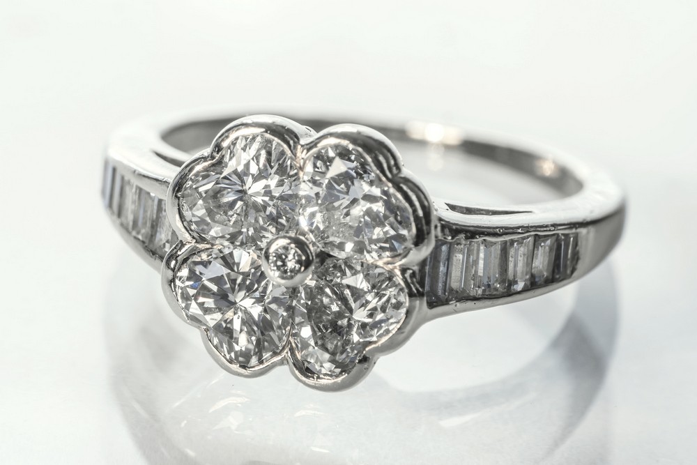 A David Morris hand made 18ct yellow gold and diamond four heart cluster ring the central floral