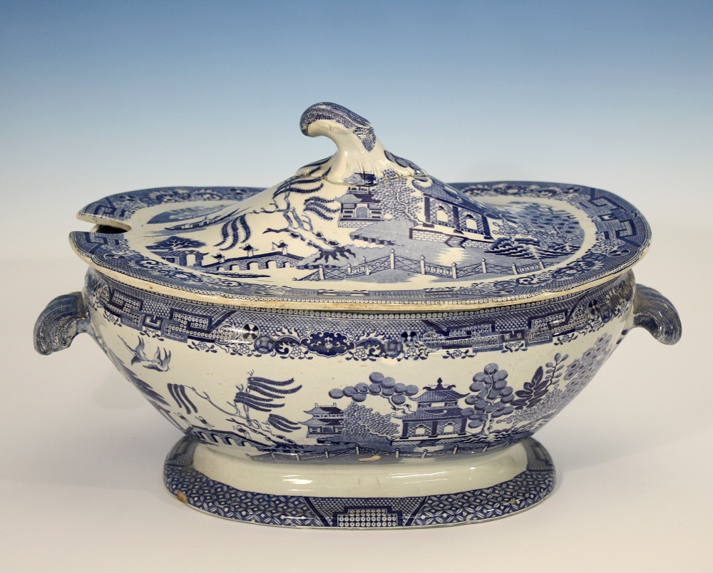 A 19th century blue and white transfer printed soup tureen and cover interior with geometric