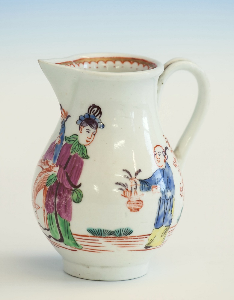 A Worcester sparrow beak cream jug late 18th century, baluster form with grooved loop handle,