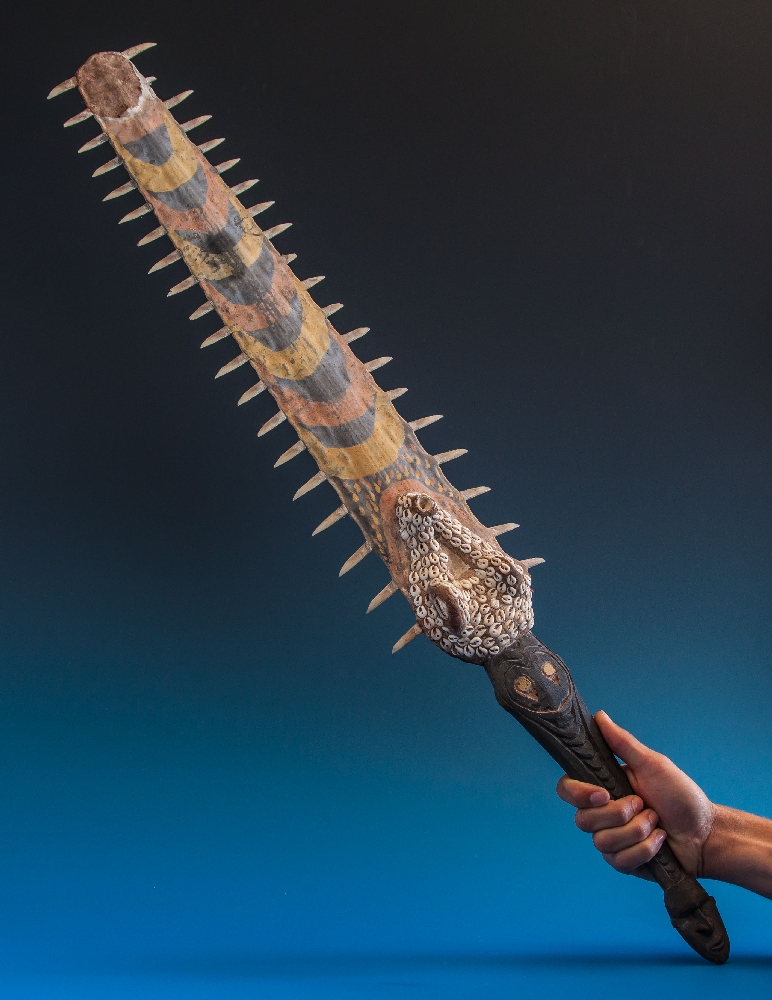 A decorated sawfish rostrum weapon probably Papua New Guinea, forty toothed blade polychrome painted