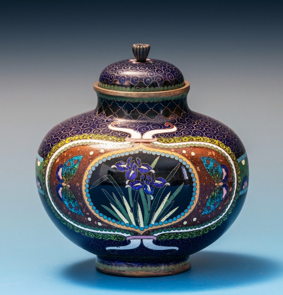 A Japanese cloisonné vase and coverMeiji period, of squat, bulbous form, with domed lid and brass