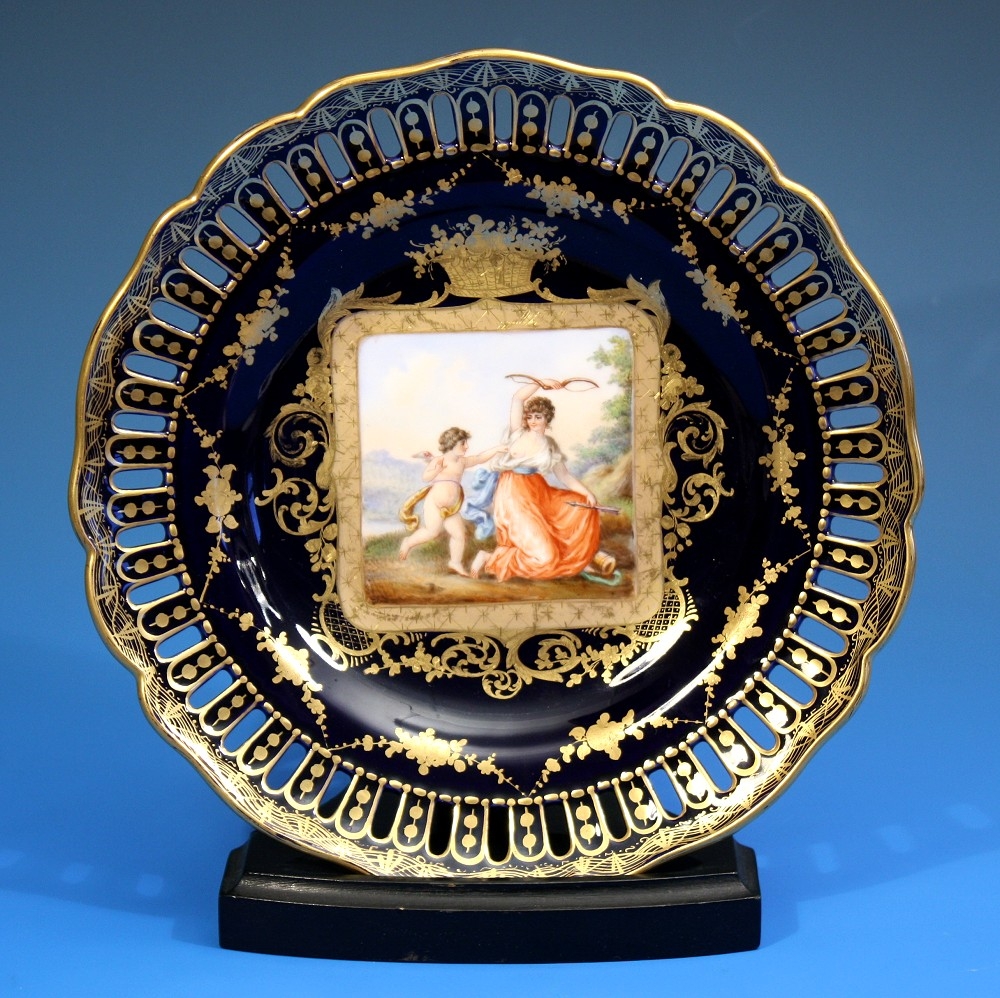 A Vienna porcelain cabinet plate late 19th century, scalloped rim with gilt decoration,