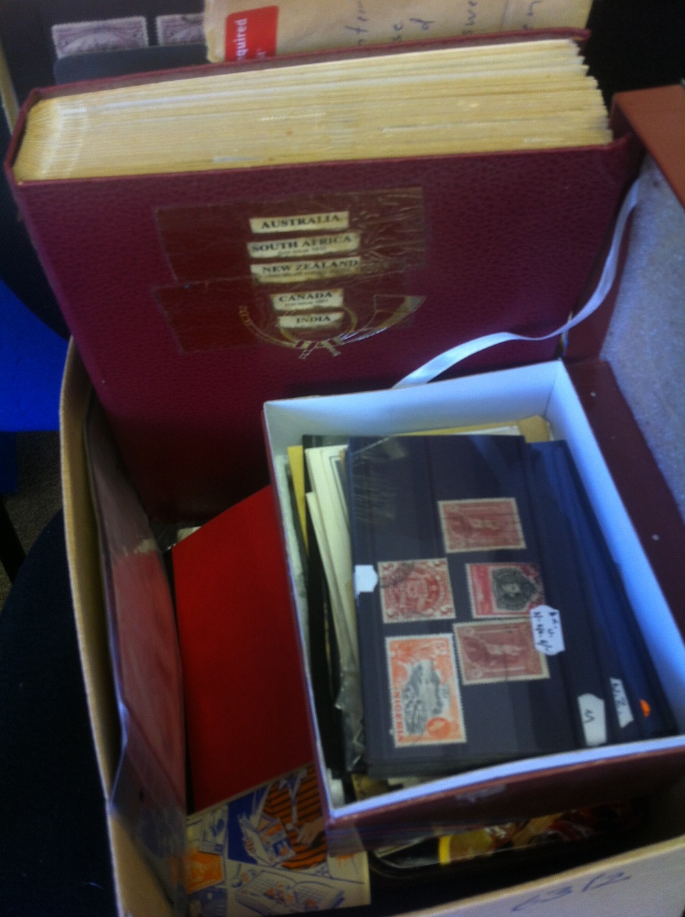 World accumulation in box, including covers, large stock book and loose stamps. Early commonwealth