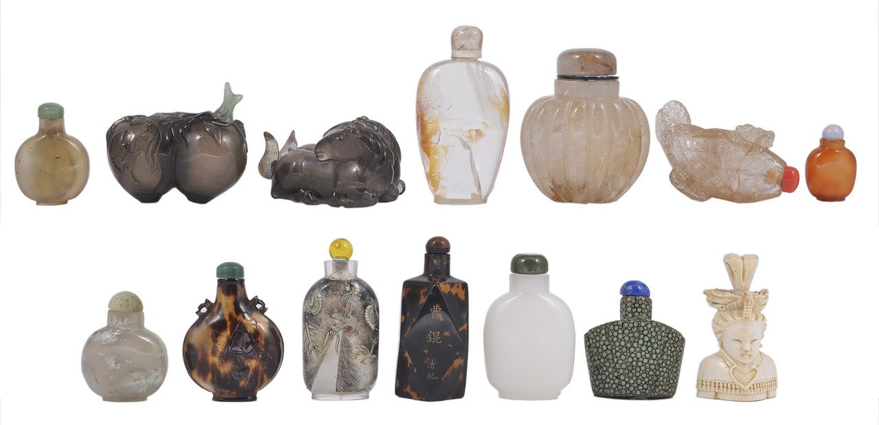 A GROUP OF FOURTEEN CHINESE SNUFF BOTTLES, 19TH - 20TH CENTURY comprising: three rock crystal