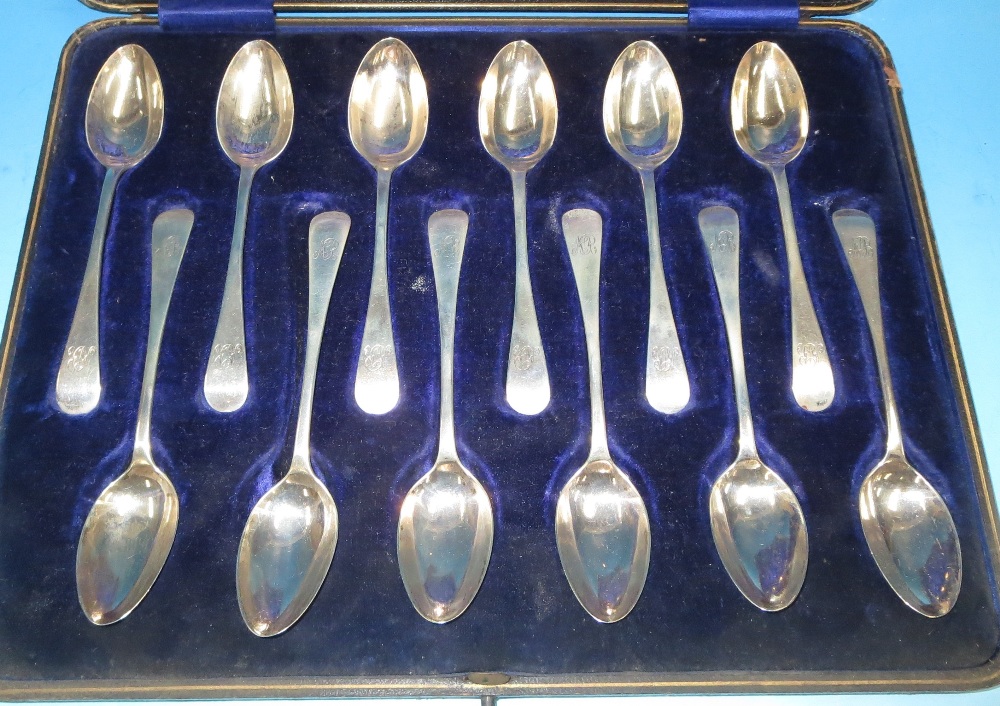 A cased set of 12 monogrammed Old English pattern teaspoons, Sheffield 1906