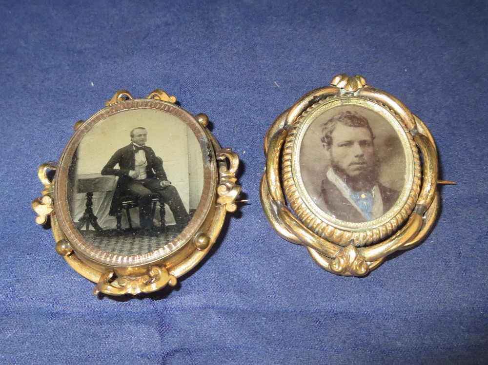 A Victorian gold plated swivel photo pendant/brooch with 2 Victorian photos; a similar single sided