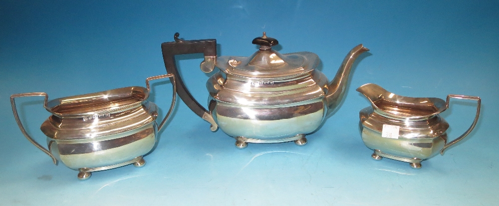 A Georgian style rounded rectangular 3 piece tea set, Birmingham 1946