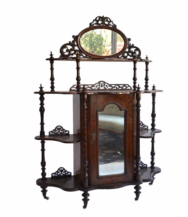 A Victorian Burr Walnut Whatnot c.1880 -1890. The whatnot is a four tier type, with fretwork