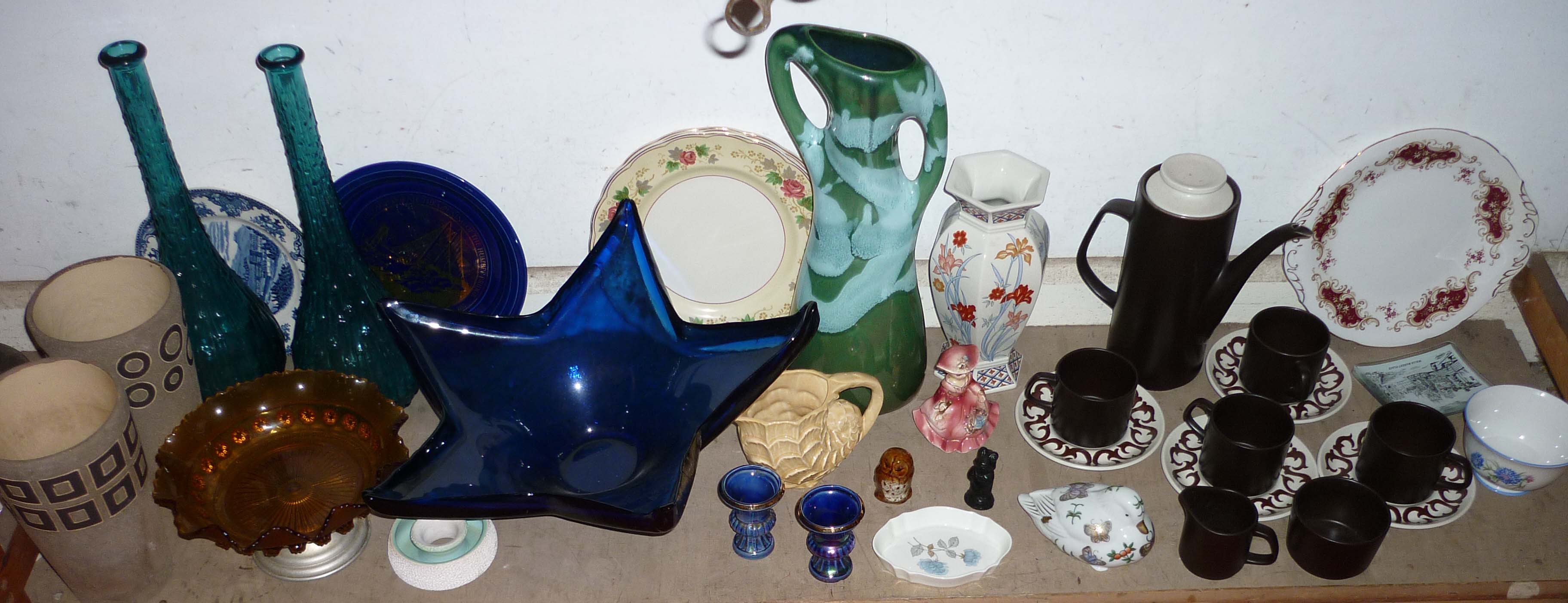 "Shelf mainly ceramics incl. Meakin pottery coffee set, blue glass star shaped centre bowl etc"