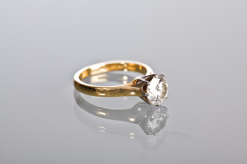 DIAMOND SOLITAIRE RING  the brilliant cut stone of approximately 1.05 carats set in eighteen carat