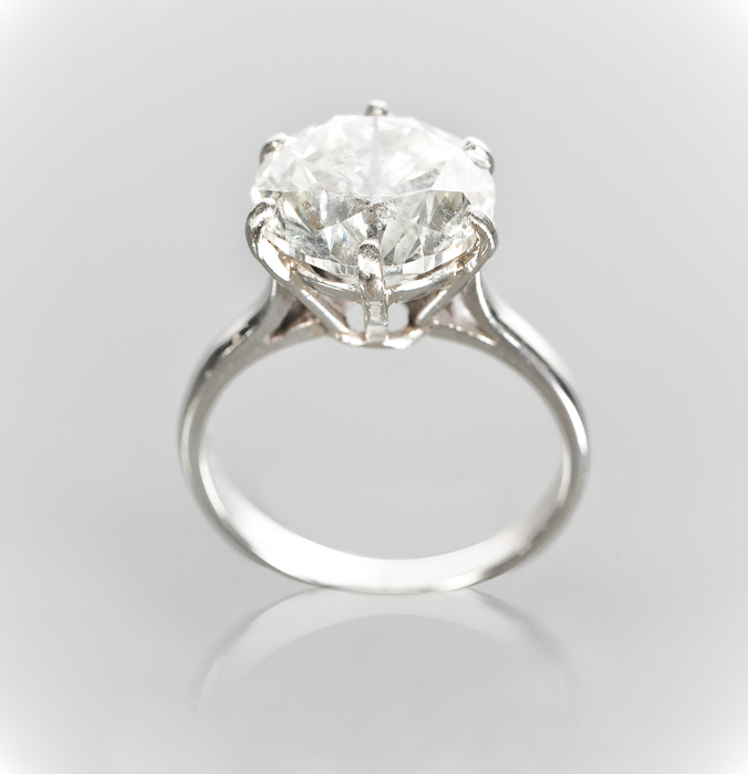 IMPRESSIVE DIAMOND SOLITAIRE RING the stone of approximately 6.50 carats set in platinum, size L