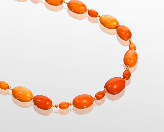 AMBER BEAD NECKLACE with alternating large and small beads, the largest bead 18mm diameter, the