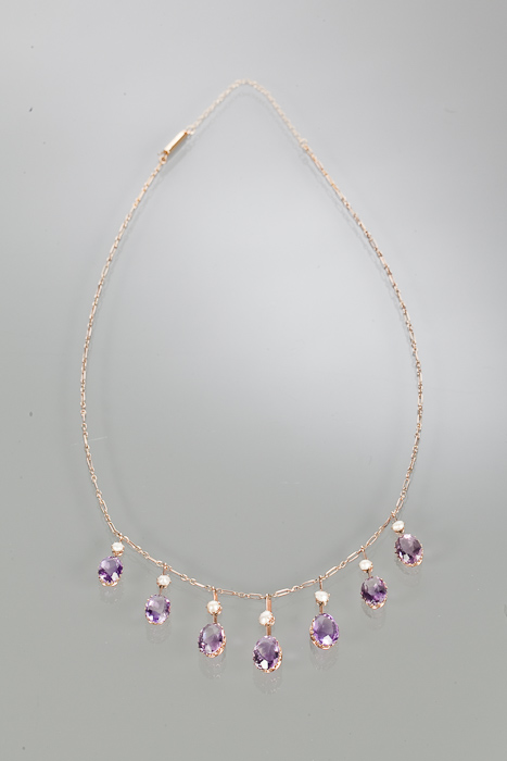 EDWARDIAN AMETHYST AND PEARL NECKLET the chain with seven graduated oval amethysts, the largest - Image 2 of 2