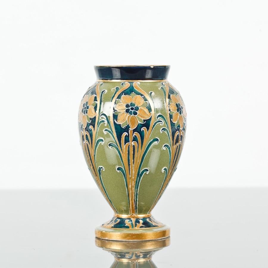 ART NOUVEAU MACINTYRE MOORCROFT FLORIAN WARE VASE with tube-lined stylized floral designs in shades