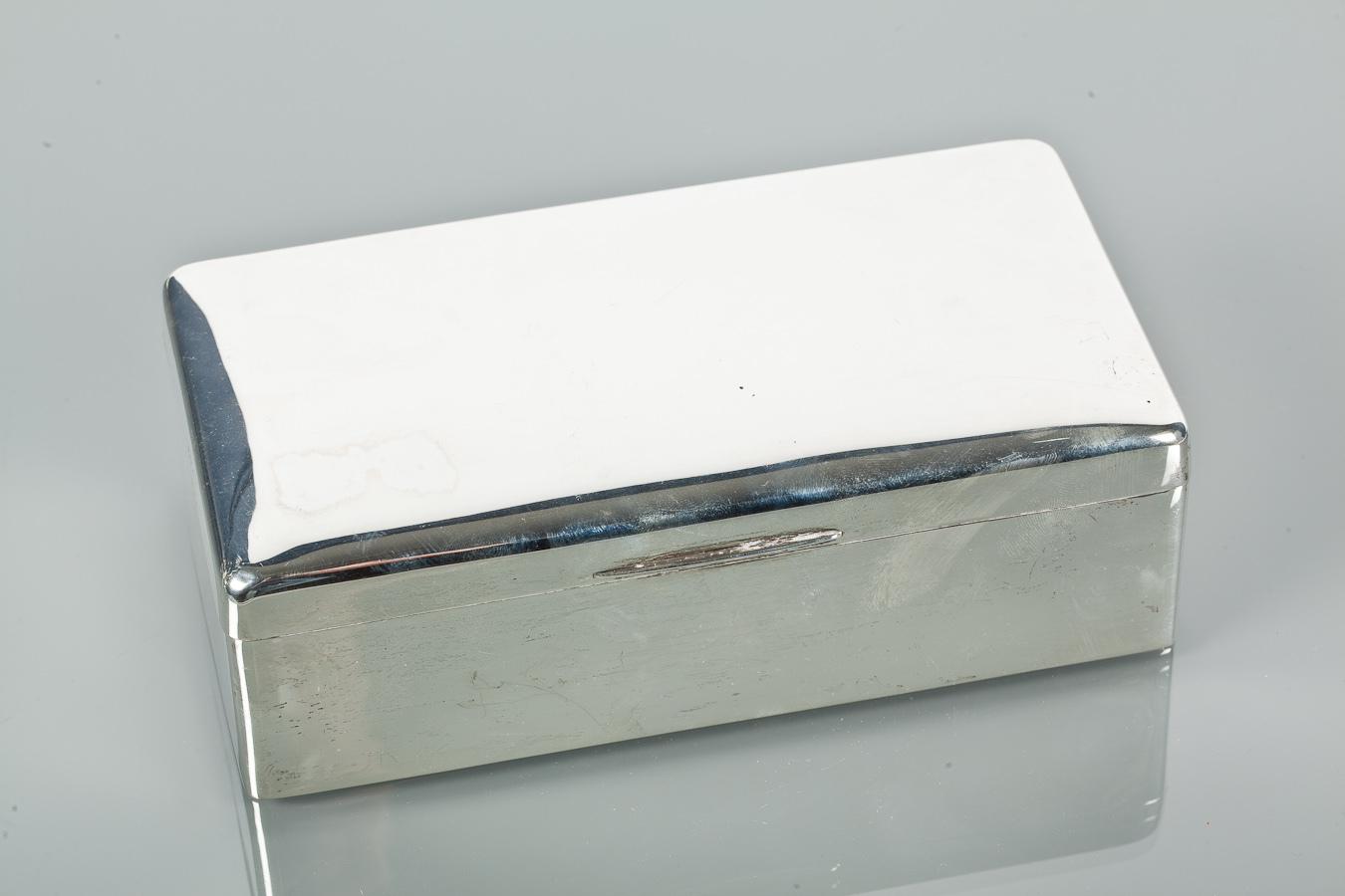 LARGE SILVER CIGARETTE BOX of rectangular form, Sheffield hallmarks, makers Walker and Hall, 20.5cm