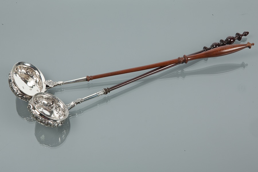 TWO SCOTTISH SILVER TODDY LADLES the first, with slender turned handle above a  vineous silver