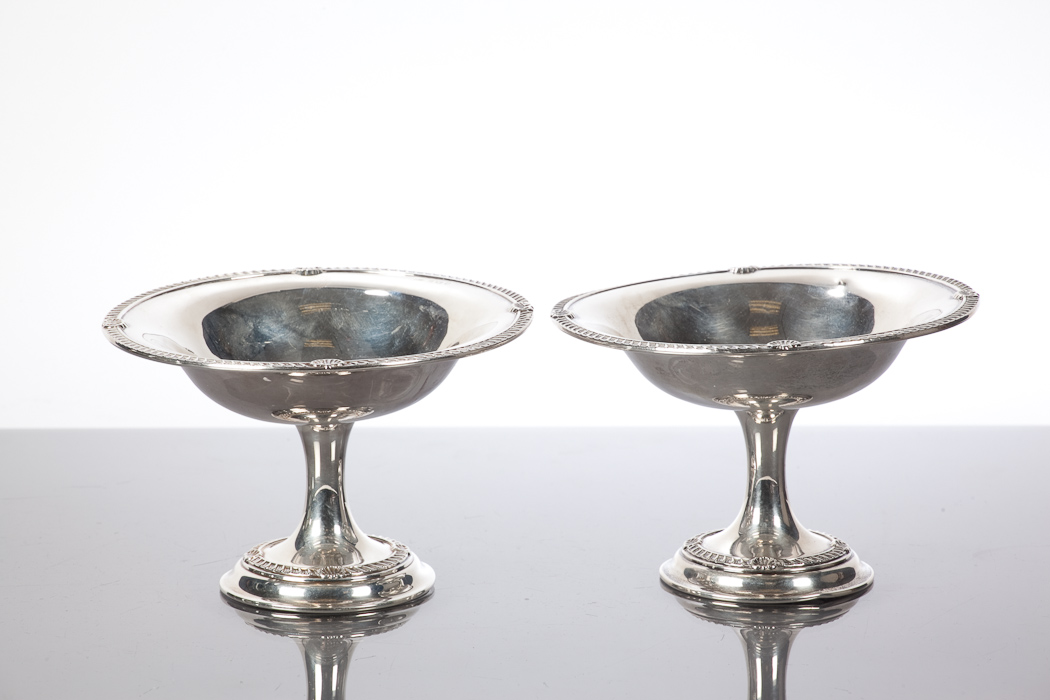 PAIR OF EDWARDIAN SILVER TAZZA with gadrooned and shell cast rims, on circular bases, Birmingham