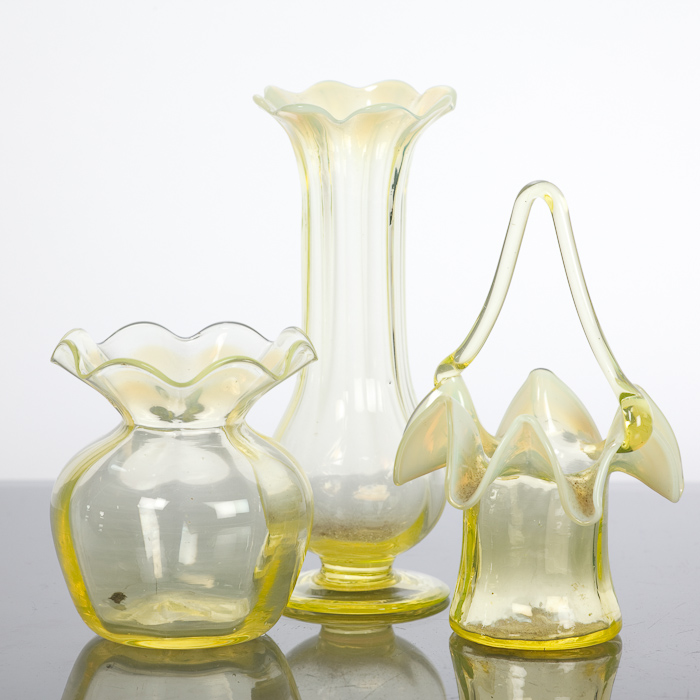 THREE PIECES OF VICTORIAN VASELINE GLASS possibly by James Powell & Sons, comprising a stem vase