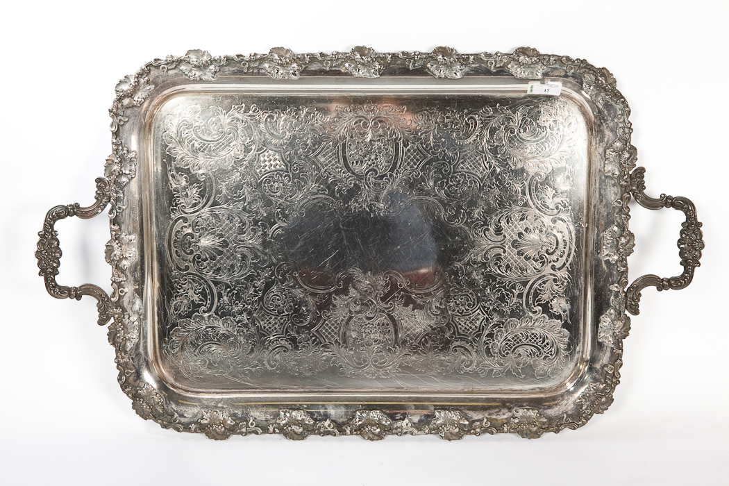 VICTORIAN SILVER PLATED RECTANGULAR TWO-HANDLED TRAY with chased c-scroll and shell decoration