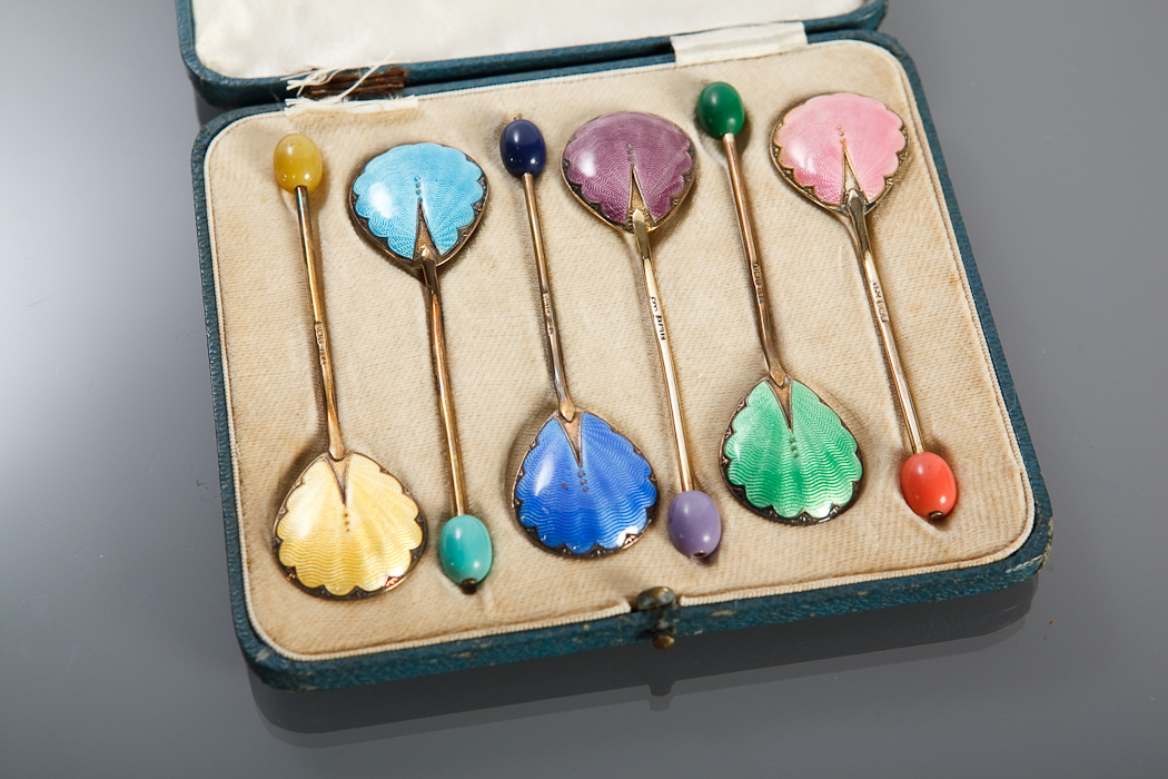 SET OF SIX SILVER AND ENAMEL TEASPOONS in fitted case