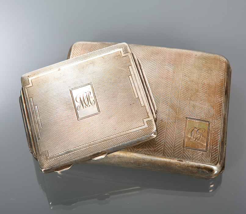 20TH CENTURY SILVER ENGINE TURNED CIGARETTE CASE 10cm long, together with an Art Deco engine turned