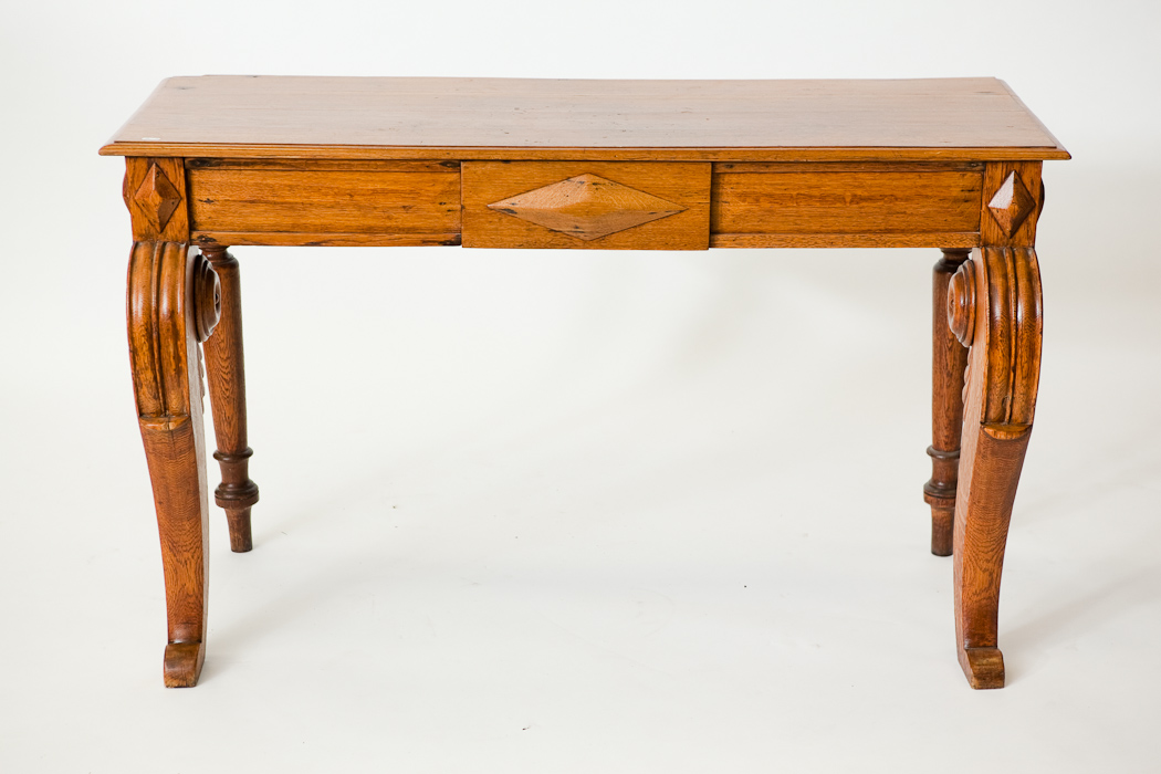 VICTORIAN OAK CONSOLE TABLE with concealed central drawer on scrolling cabriole legs, 81cm high,