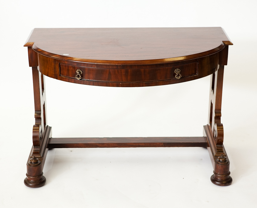 VICTORIAN MAHOGANY DEMI LUNE WASH STAND with single drawer above pierced supports on bun feet, 70