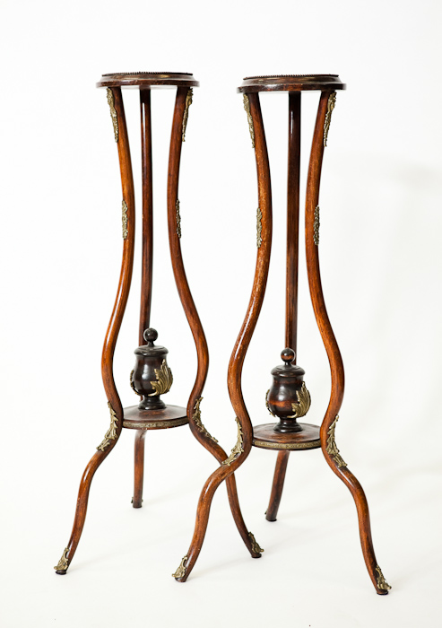 PAIR OF FRENCH MAHOGANY BRASS MOUNTED TORCHERE STANDS on cabriole legs, 93cm high