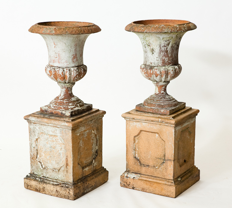 PAIR OF STONEWARE GARDEN CAMPAGNA URNS on square plinths, 110cm high