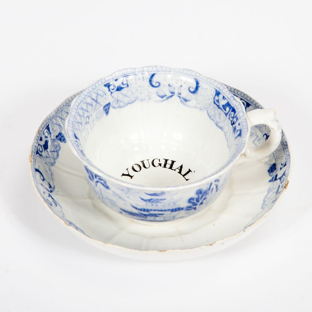 A RARE YOUGHAL WESLEYAN SOCIETY BLUE AND WHITE CUP AND SAUCER, 
19th century, inscribed on both. (