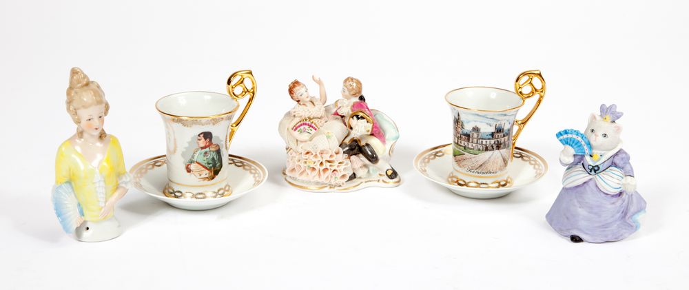 A 10 PIECE PART LIMOGES PORCELAIN COFFEE SERVICE, 
some cups with portraits of Napoleon in transfer;