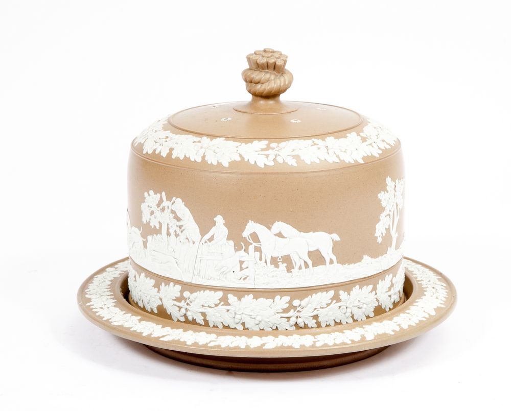 A BROWN AND WHITE JASPERWARE CHEESE DISH AND COVER, 
the pierced domed cover with a band of oak leaf