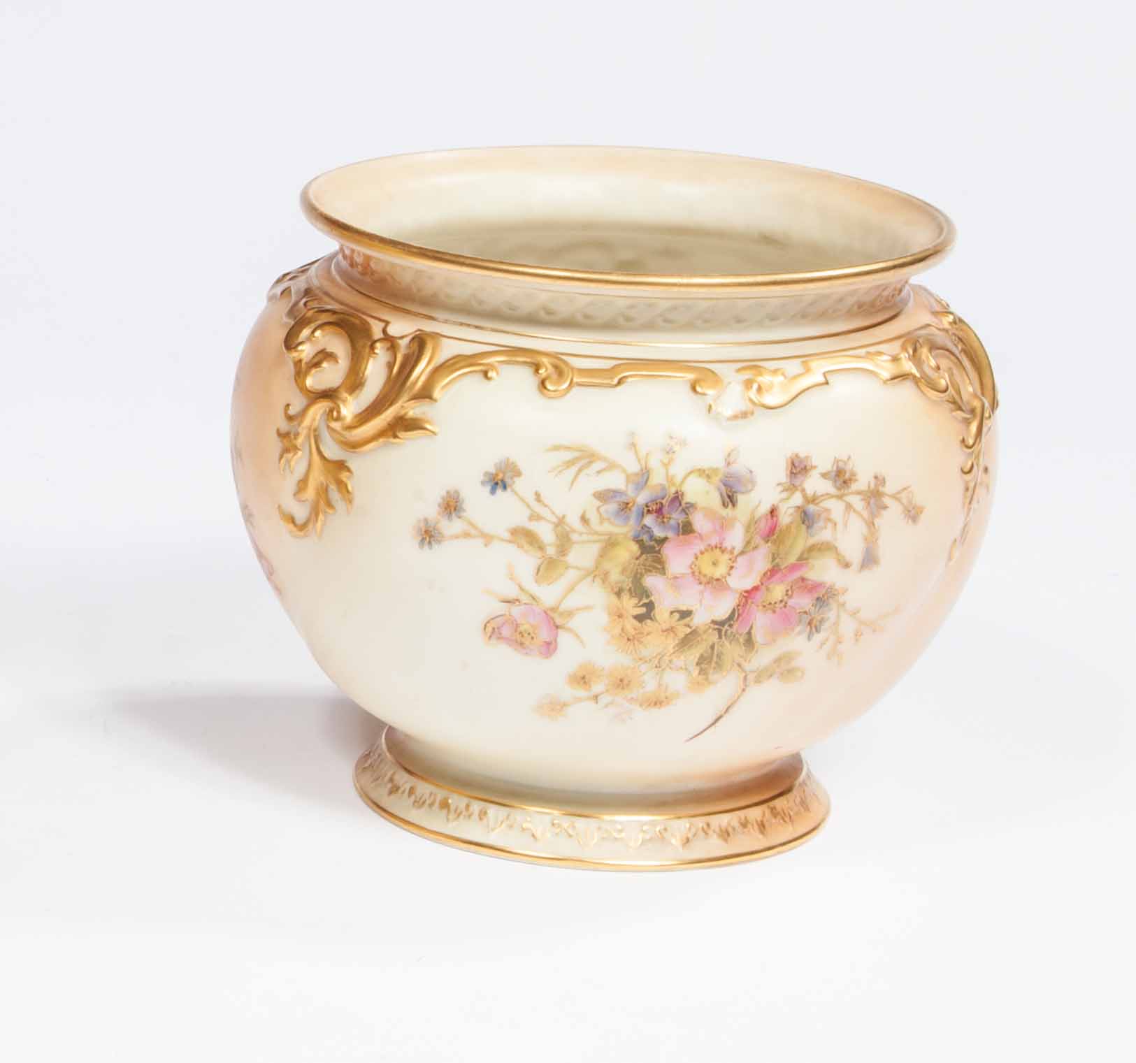 A GOOD ROYAL WORCESTER RELIEF MOULDED AND FLORAL DECORATED JARDINIERE, 
6.75in (17cm). (1)
