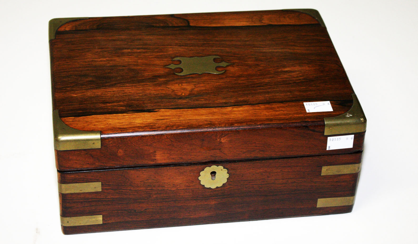 AN EARLY 19TH CENTURY BRASS BOUND ROSEWOOD BOX,
12in (30cm). (1)