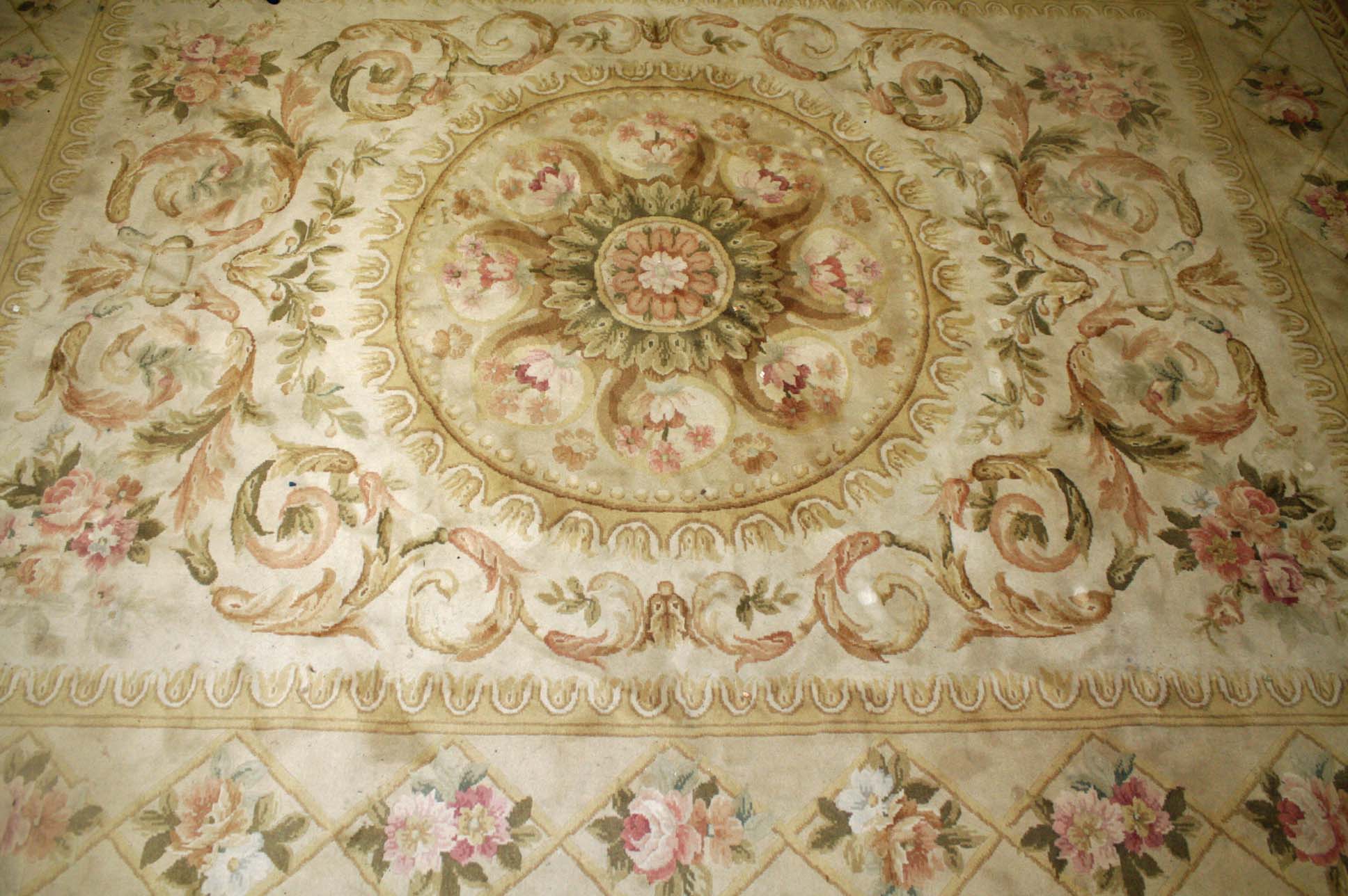 A MODERN CHINESE SAVONERIE HANDMADE CARPET, with centre circular floral medallion on an ivory ground