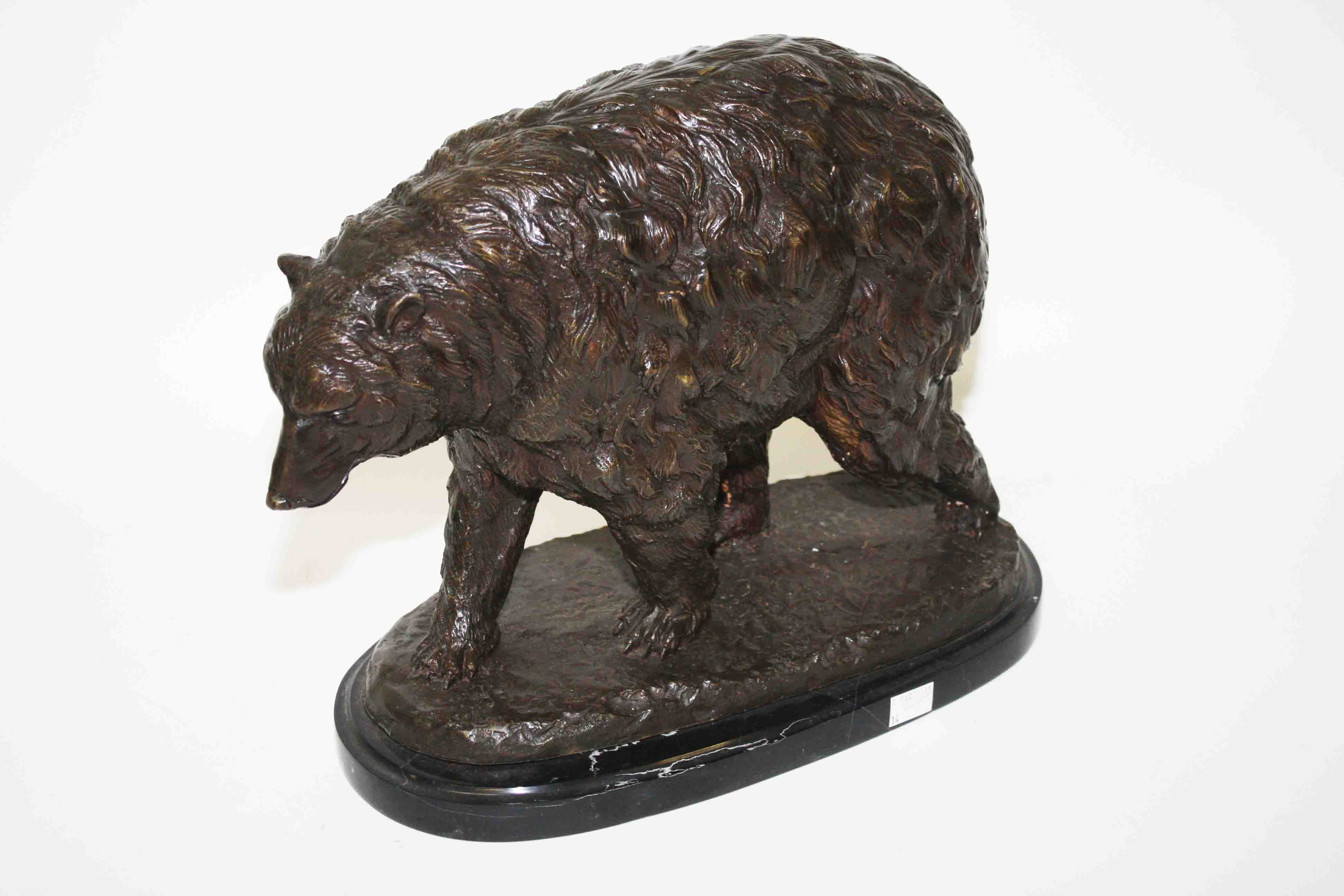 A BRONZE STUDY OF A GRISLY BEAR, O.R.M., on marble base, 12.5in (32cm). (1)