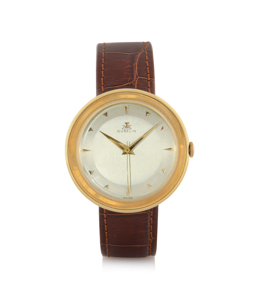 GULBELIN ""DISCO VOLANTE"" ANNI `50.  C. 18K yellow gold with hidden lugs (very good). D. two-tone