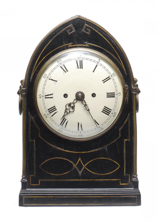 A REGENCY EBONY LANCET ARCHED BRACKET CLOCK  GIBSON ROYAL EXCHANGE LONDON  with painted dial, twin
