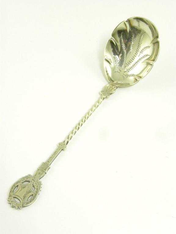 A ORNATE VICTORIAN SILVER SUGAR SIFTER WITH LEAF SHAPED BOWL AND PIERCED TERMINAL, SHEFFIELD 1850,