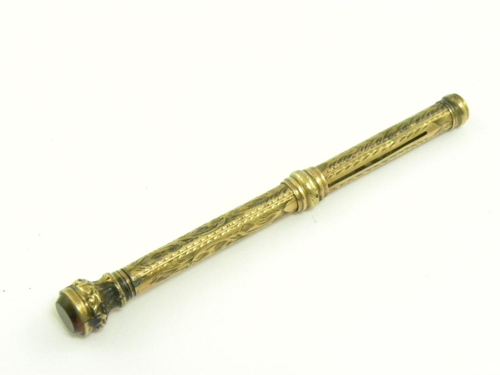 A VICTORIAN 9CT GOLD PENCIL, BIRMINGHAM 1899