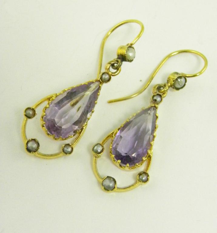 A PAIR OF PEAR SHAPED AMETHYST AND GOLD EARRINGS