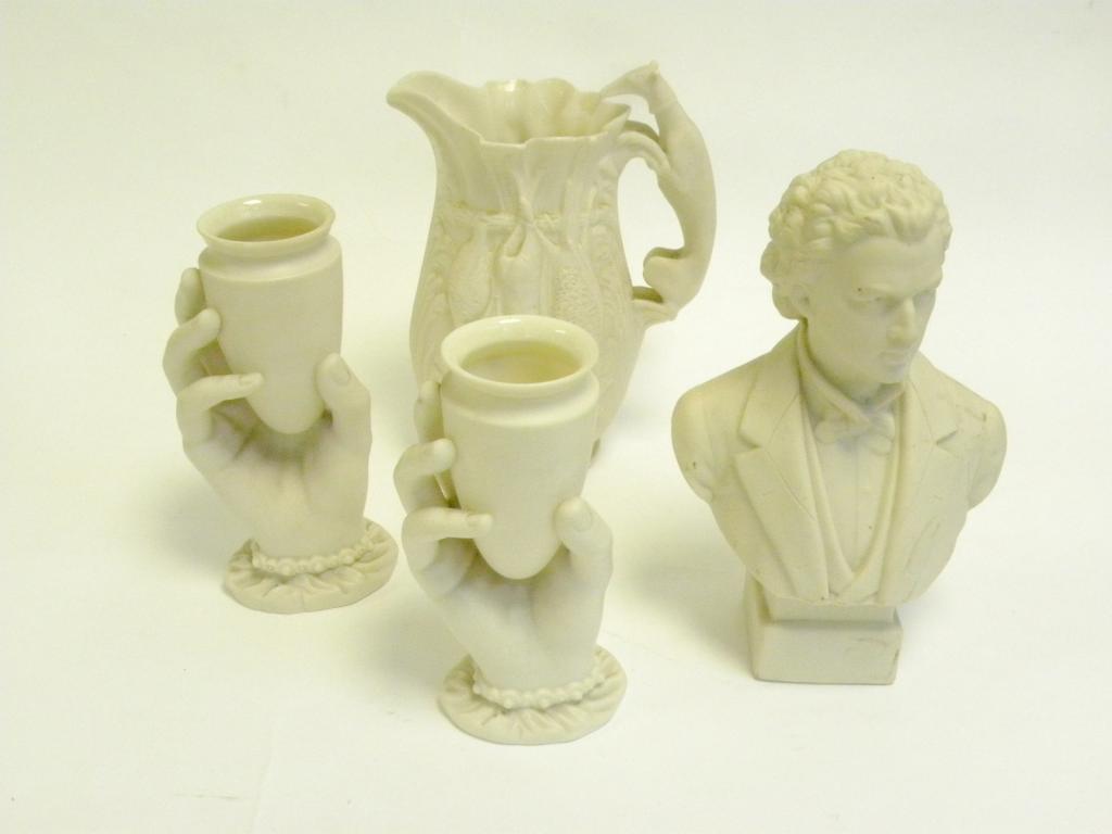 Two ROYAL WORCESTER PARIAN WARE LADY`S HAND SPILL VASES, A PARIAN WARE JUG MOULDED WITH GAME, HAND
