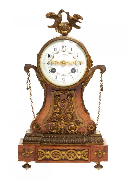 A FRENCH ORMOLU MOUNTED BURR MAPLE MANTLE CLOCK the drum cased movement with primrose enamel dial